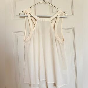 White sleeveless blouse